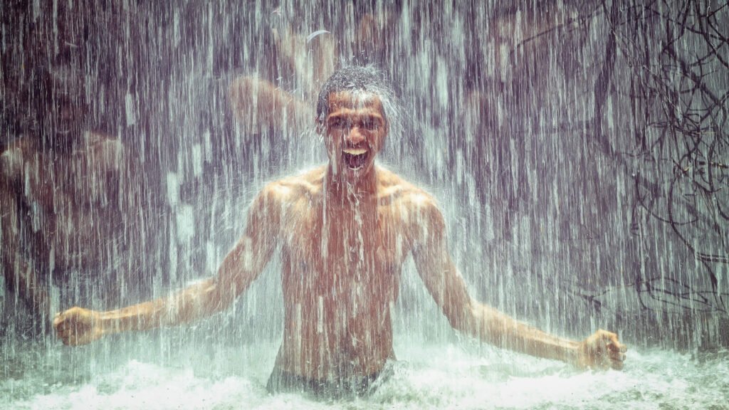 A man stepping directly into a cold shower to reset his dopamine baseline and overcome intense cravings.